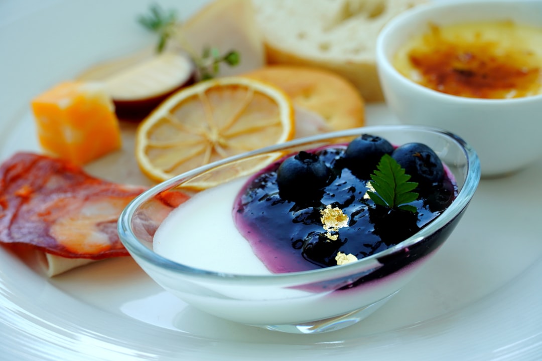 A white plate topped with different types of food