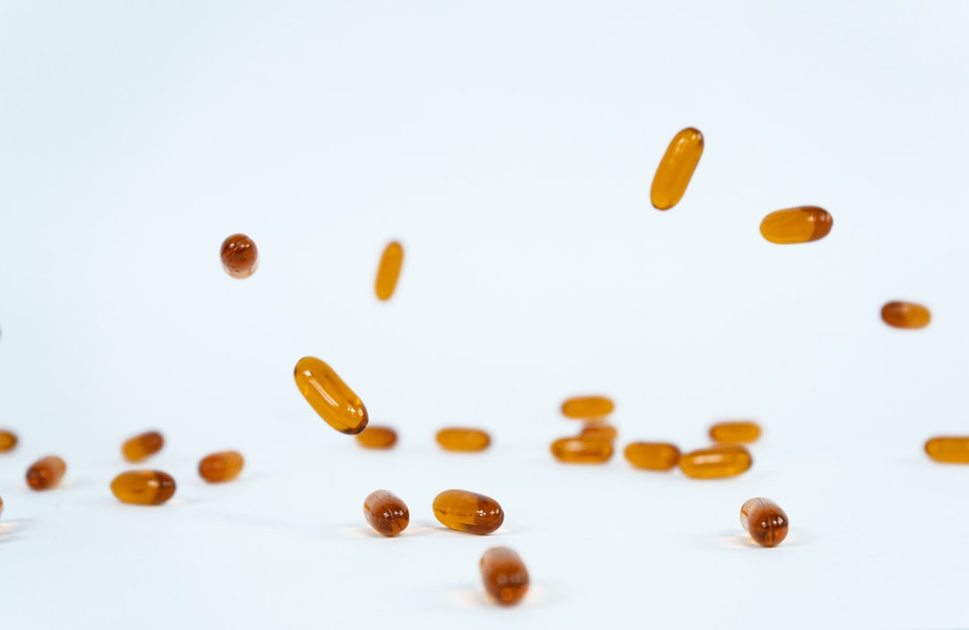 a group of pills falling into the air