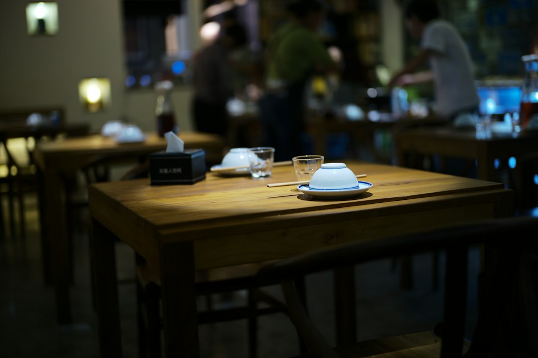 Empty restaurant tables set for dining